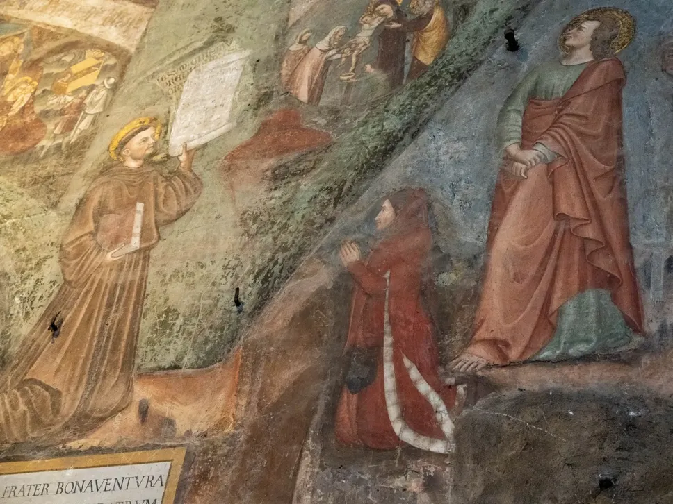 Un dettaglio dell’Albero della Vita in Santa Maria Maggiore: l’uomo inginocchiato vestito di rosso è Guidino Suardi