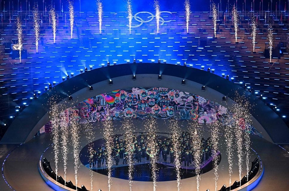 Volunteers perform during the closing ceremony of the Milano Cortina 2026 Winter Olympic Games at the Verona Arena in Verona, northern Italy, on February 22, 2026. (Photo by Gabriel BOUYS / AFP)