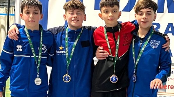 Il podio kumite: Enrico Cicuttini (Olimpia Bg), Thomas Maldi (Aves Aquila Bg), Tommaso Aidala e Mattia Floarea