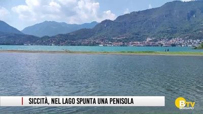 https://storage.ecodibergamo.it/media/photologue/2026/8/19/photos/cache/manca-la-pioggia-nel-lago-compare-una-penisola_0903fefa-9bd9-11f1-aef0-e5ef0e0e9010_display.jpg